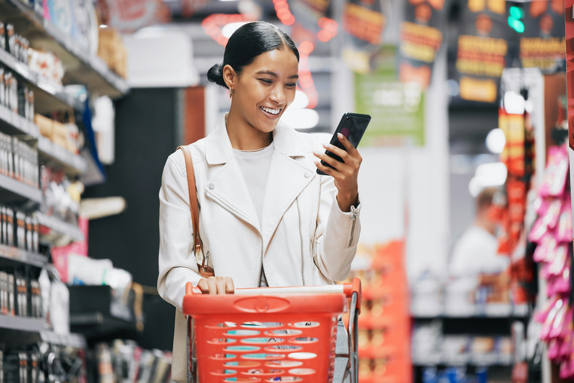 Phone, 5g internet and grocery shopping Indian woman reading a funny text or social media content.